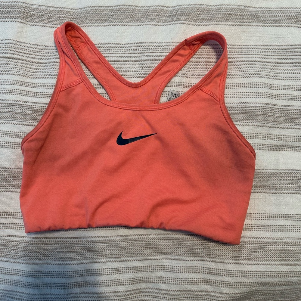 Nike Dri fit Sports Bra Trainer tank Size Medium coral pink color